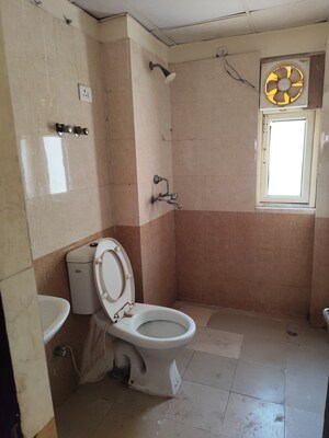 Bathroom in 3.5 BHK Apartment at Aims Golf City, Sector 75 – for Rent