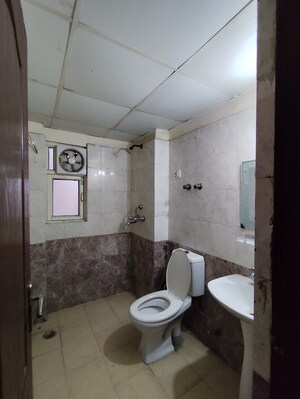 Bathroom in 3.5 BHK Apartment at Aims Golf City, Sector 75 – for Rent