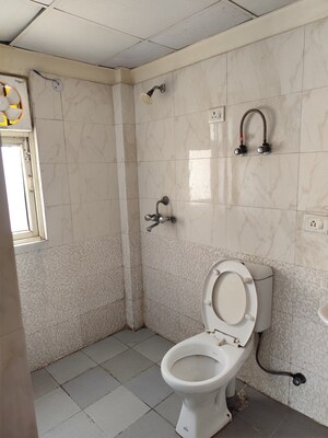 Bathroom in 3.5 BHK Apartment at Aims Golf City, Sector 75 – for Rent