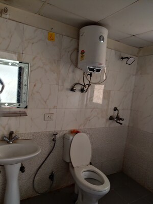 Bathroom in 3.5 BHK Apartment at Aims Golf City, Sector 75 – for Rent