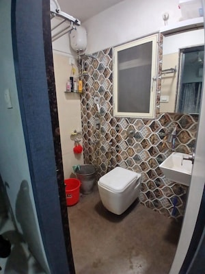 Master Bedroom in 1 BHK Apartment at Shree Riddhi Siddhi Sumukh Hills, Kandivali East – for Rent