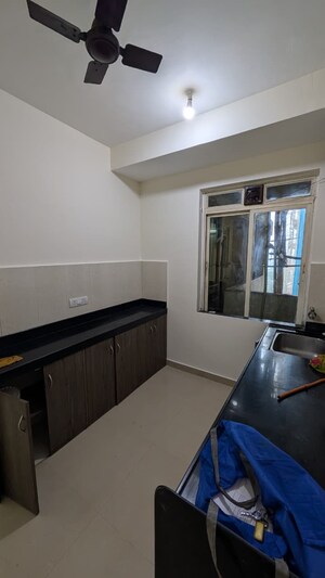 Kitchen in 2 BHK Apartment at Rustomjee Athena, Majiwada – for Rent