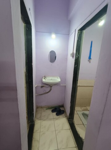 Bathroom in 1 RK Apartment at Kopar Khairane – for Rent