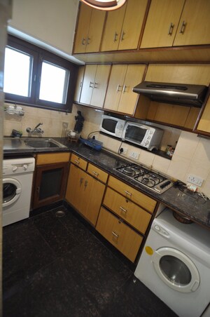 Kitchen in Studio Builder Floor at Sunder Nagar – for Rent