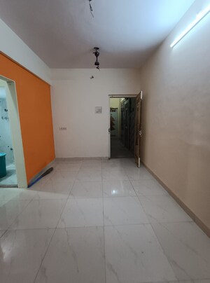 Living Room in 1 BHK Apartment at Kopar Khairane – for Rent