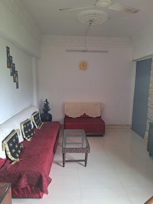 Bedroom in 2 BHK Apartment at Parijat CHS Andheri West, Yari Road – for Rent