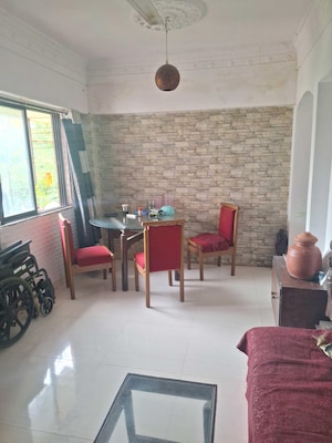 Living Room in 2 BHK Apartment at Parijat CHS Andheri West, Yari Road – for Rent