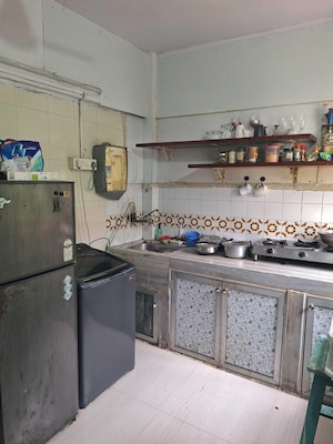 Kitchen in 2 BHK Apartment at Parijat CHS Andheri West, Yari Road – for Rent