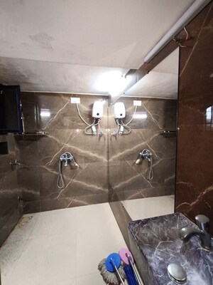 Bathroom in 1 BHK Apartment at CCI Colony, Goregaon West – for Rent