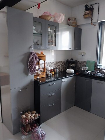 Kitchen in 1 BHK Apartment at Neptune Living Point, Bhandup West – for Sale