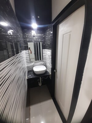 Bathroom in 2 BHK Apartment at Ganesham Phase I, Pimple Saudagar – for Rent