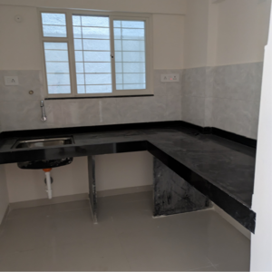 Kitchen in 1.5 BHK Apartment at Wadgaon Sheri – for Rent