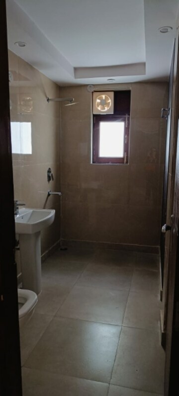 Bathroom in 4 BHK Builder Floor at Green Fields Colony – for Rent