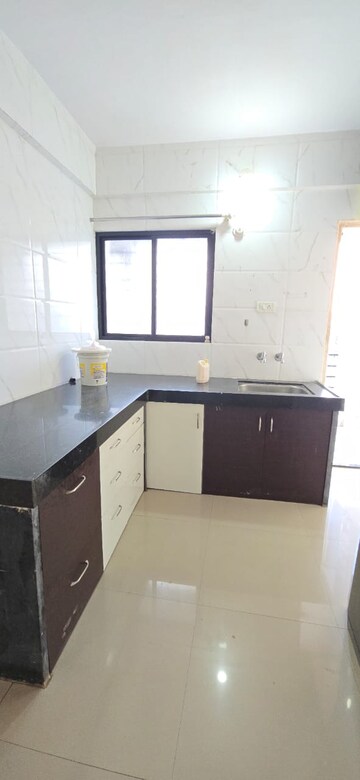 Kitchen in 1 BHK Apartment at Wadgaon Sheri – for Rent