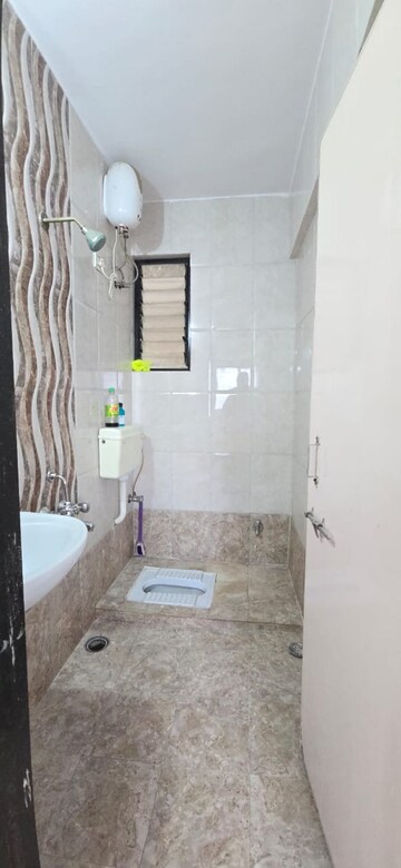 Bathroom in 1 BHK Apartment at Wadgaon Sheri – for Rent