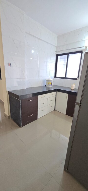 Kitchen in 1 BHK Apartment at Wadgaon Sheri – for Rent