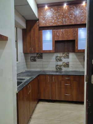 Kitchen in 2 BHK Apartment at Gaur City 7th Avenue, Sector 4 Greater Noida – for Rent