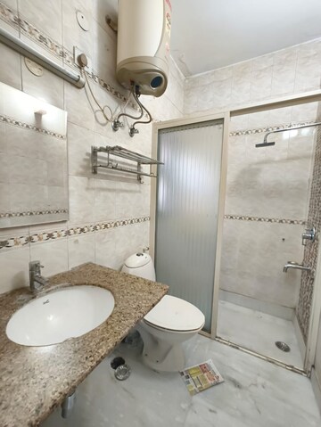 Bathroom in 3 BHK Builder Floor at Nehru Enclave – for Rent