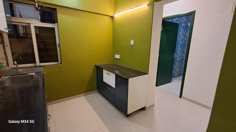 Kitchen, owale 2 Bedroom 860 Sq.Ft. Apartment In Owale Thane 9288886