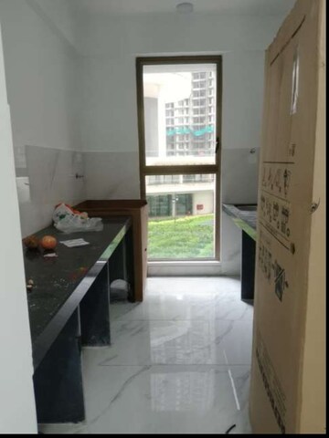 Kitchen in 2 BHK Apartment at Raymond Ten X Habitat, Pokhran Road No Two – for Rent