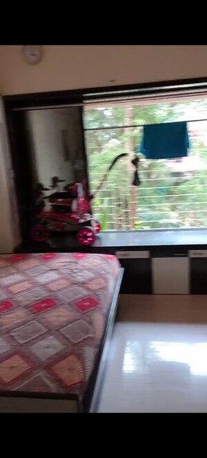 Bedroom in 1 BHK Apartment at Gokul Regency Apartment, Kandivali East – for Sale