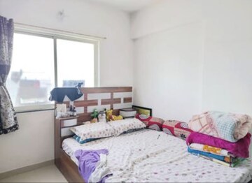 Bedroom in 2 BHK Apartment at Swastik Pride Homes, Rahatani – for Rent