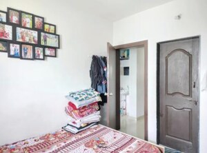 Master Bedroom in 2 BHK Apartment at Swastik Pride Homes, Rahatani – for Rent