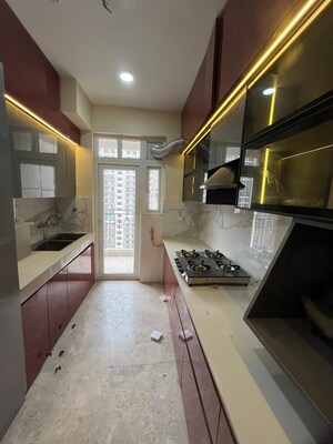 Kitchen in 2 BHK Apartment at Samridhi Grand Avenue, Tech Zone 4 Greater Noida – for Sale