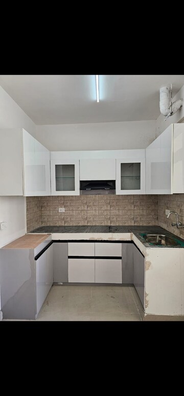 Kitchen in 2 BHK Apartment at Suncity Avenue 76, Sector 76 – for Rent