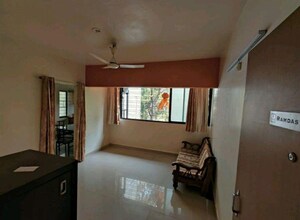 Living Room in 1 BHK Apartment at Warje – for Rent