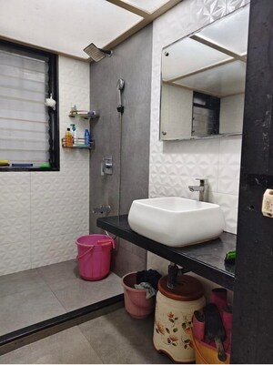 Bathroom in 2 BHK Apartment at Andheri CHS, Andheri West – for Rent