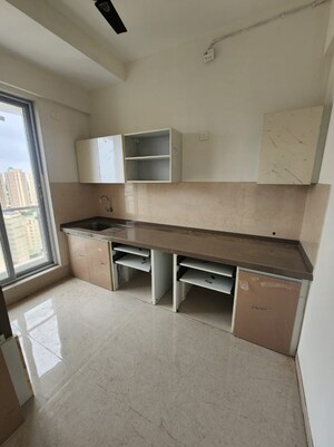 Kitchen in 2 BHK Apartment at Rosa Manhattan, Ghodbunder Road – for Sale
