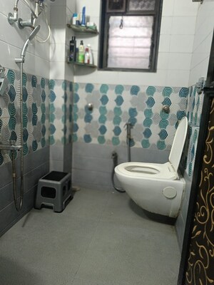 Bathroom in 2 BHK Apartment at Riddhi Gardens CHS, Malad East – for Sale