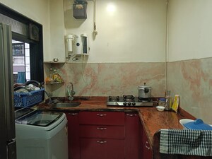 Kitchen in 2 BHK Apartment at Riddhi Gardens CHS, Malad East – for Sale