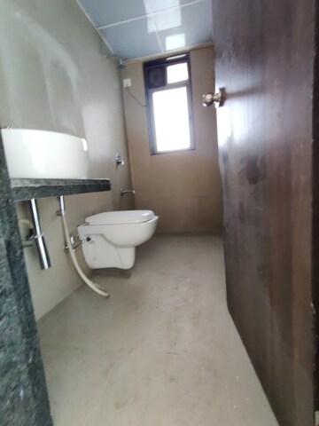 Bathroom in 2 BHK Apartment at Runwal Eirene, Balkum Pada – for Rent