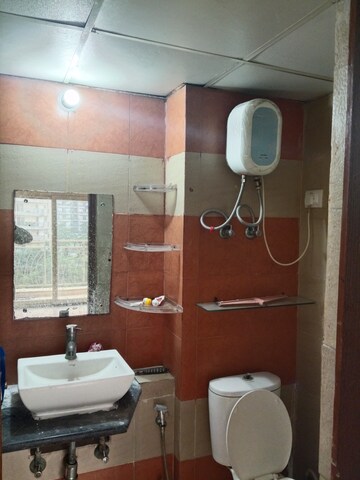 Bathroom in 2.5 BHK Apartment at Mahagun Mywoods II, Sector 16c Greater Noida – for Rent