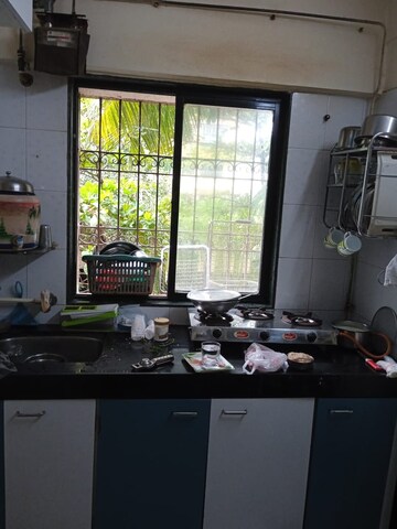 Kitchen in 2 BHK Apartment at Umiya Nagar CHS, Goregaon East – for Rent