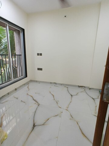 Bedroom in 2 BHK Apartment at MP Pandurangwadi Laxmi Niwas CHS, Goregaon East – for Rent
