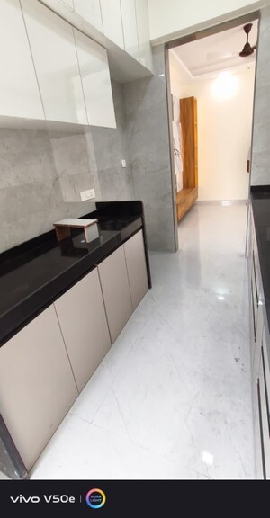 Kitchen in 2 BHK Apartment at MG Complex, Vashi Sector 11 – for Rent