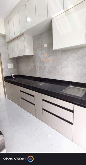 Kitchen in 2 BHK Apartment at MG Complex, Vashi Sector 11 – for Rent