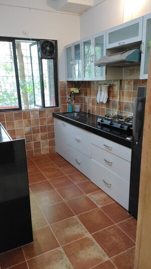 Kitchen in 1 BHK Apartment at Riddhi Garden, Malad East – for Rent