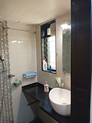 Bathroom in 2 BHK Apartment at Dheeraj Valley, Goregaon East – for Rent