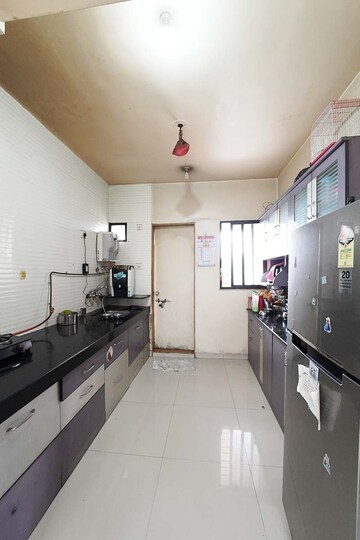 Kitchen in 2 BHK Apartment at Shree Venkatesh Marvilla Apartment, Hadapsar – for Sale