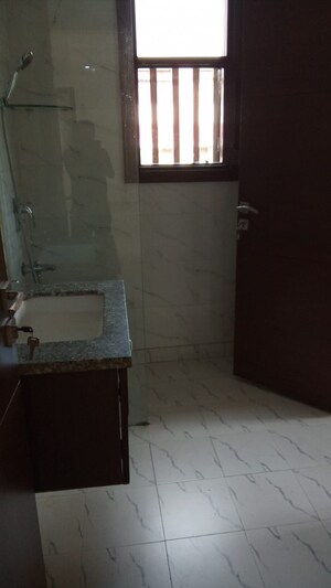 Bathroom in 4 BHK Builder Floor at East Of Kailash – for Rent