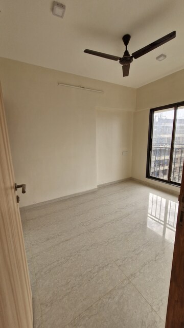 Room in 2 BHK Apartment at Pratham ARC Aura, Andheri West – for Rent