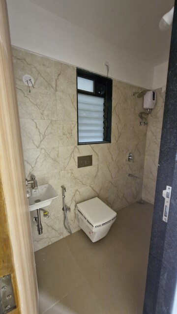 Bathroom in 2 BHK Apartment at Pratham ARC Aura, Andheri West – for Rent