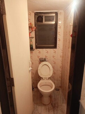 Bathroom in 1 BHK Apartment at Brindaban CHS, Poonam Nagar – for Rent