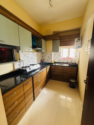 Kitchen in 2 BHK Apartment at Mani Casa, New Town – for Rent