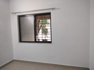 Room in 1 BHK Apartment at Laxmi Nagar Society, Dhanori – for Rent