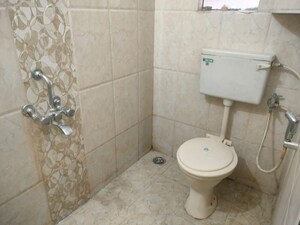 Bathroom in 1 BHK Apartment at Laxmi Nagar Society, Dhanori – for Rent